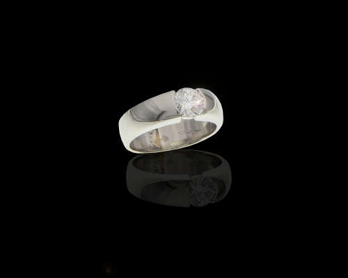 9,4 grams Platinum Round Brilliant Diamond 0.65 J VVS2 Solitaire Ring