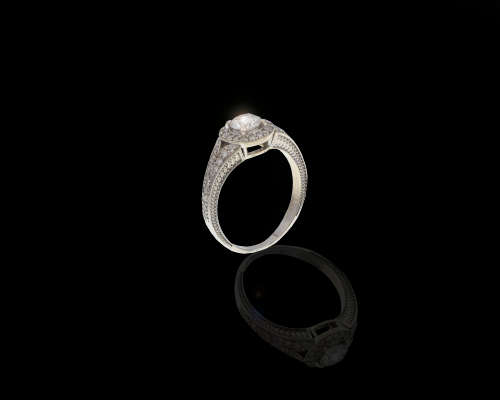 4.7gr 18kt White Gold 0.50ct Round Rrilliant I SI1 Halo with smalls  c/w Diamond Cetificate