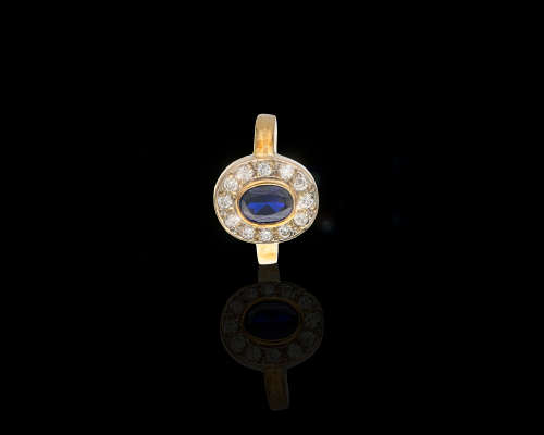 9ct (3.9 grams) Yellow gold Oval sapphire and diamond dress ring