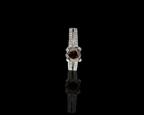 Platinum (9.2grams) 1.68ct Pear cut Cognac Diamond 0.1ct Diamonds on the side with an ATG Cert Ring