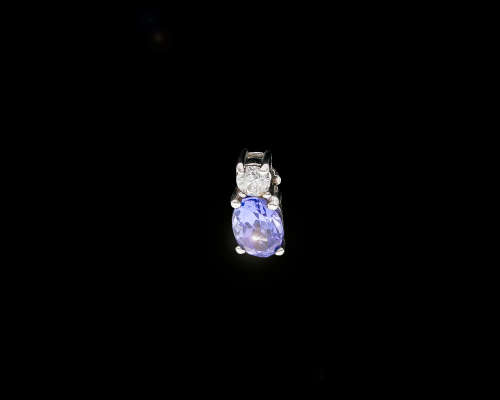 0.5 grams 9 carat White Gold Oval Tanzanite and Diamond Pendant