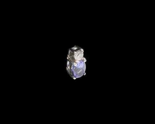 0.5 grams 9 carat White Gold Oval Tanzanite and Diamond Pendant