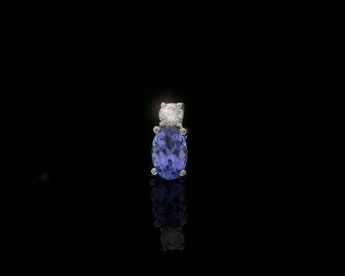0.5 grams 9 carat White Gold Oval Tanzanite and Diamond Pendant