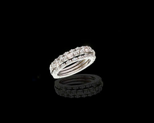 8.3 grams 18 carat White Gold and Diamond Triple Half Eternity Ring