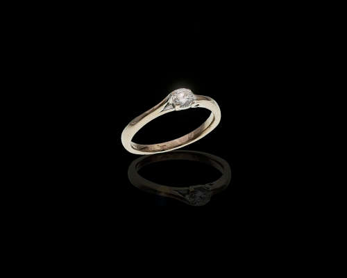 18ct (3.6 gram) Browns White gold Solitaire Diamond Ring c/w a tine Sapphire on the band
