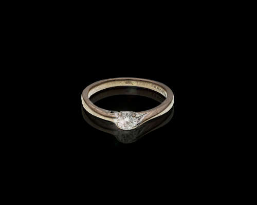 18ct (3.6 gram) Browns White gold Solitaire Diamond Ring c/w a tine Sapphire on the band