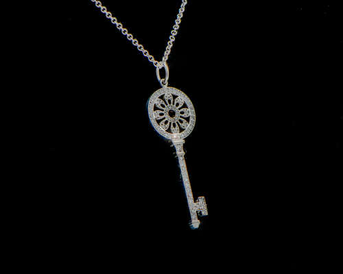 3.2 grams 9 carat White Gold, Chain and Diamond Key Pendant