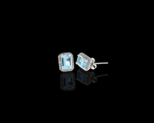 2 grams 9 carat White Gold Blue Topaz and Diamond Stud Earrings