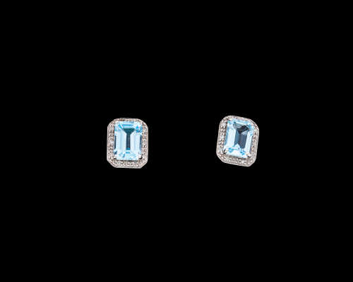 2 grams 9 carat White Gold Blue Topaz and Diamond Stud Earrings