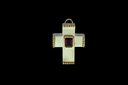 21.3 grams Two Tone ( Sterling Silver and 18 carat Gold) Garnet Designer Cross Pendant