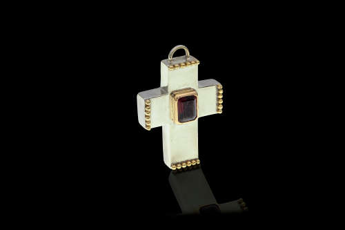 21.3 grams Two Tone ( Sterling Silver and 18 carat Gold) Garnet Designer Cross Pendant