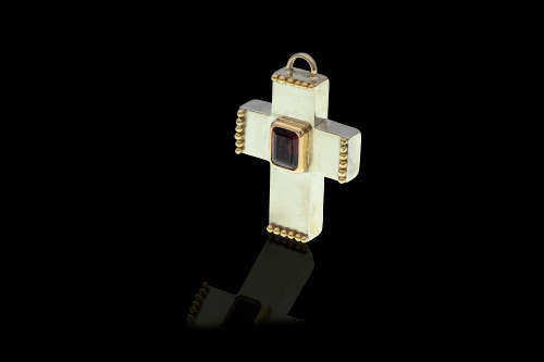 21.3 grams Two Tone ( Sterling Silver and 18 carat Gold) Garnet Designer Cross Pendant