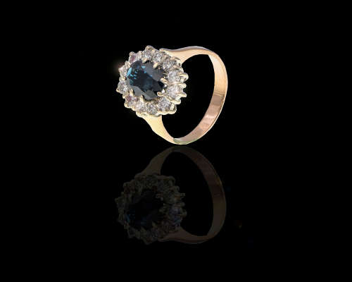 3.8 grams 14 carat Yellow Gold Sapphire and Diamond Halo Ring