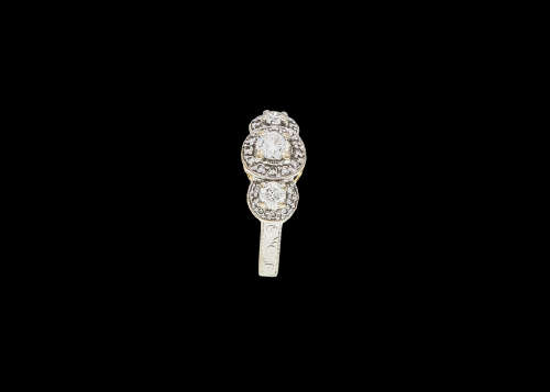 6.3 grams 18 carat Two Tone (White and Yellow Gold) Engraved Halo Trilogy Ring