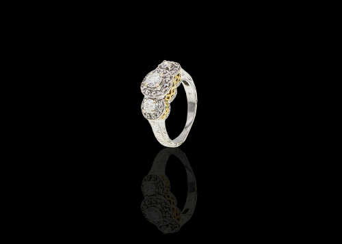 6.3 grams 18 carat Two Tone (White and Yellow Gold) Engraved Halo Trilogy Ring