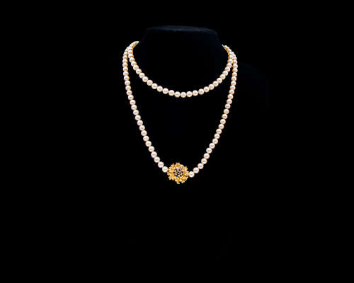 Single Strand Cultured Pearl Necklace with a 5.5 gram 18 carat Yellow Gold Clasp with Sapphires