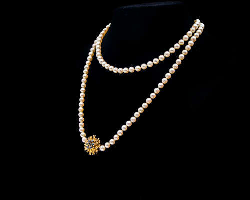 Single Strand Cultured Pearl Necklace with a 5.5 gram 18 carat Yellow Gold Clasp with Sapphires