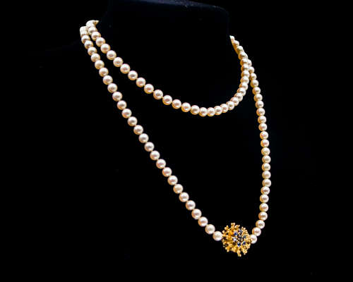 Single Strand Cultured Pearl Necklace with a 5.5 gram 18 carat Yellow Gold Clasp with Sapphires