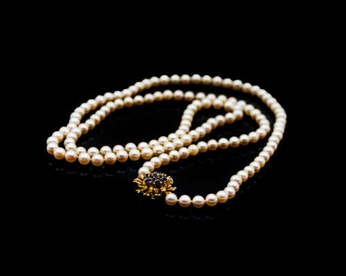 Single Strand Cultured Pearl Necklace with a 5.5 gram 18 carat Yellow Gold Clasp with Sapphires