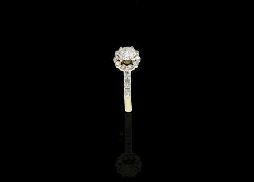 3.5 grams 18 carat White Gold Diamond Halo Ring