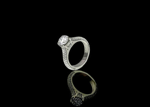 10.98 grams Platinum ORO Design Fancy Solitaire and Diamond Encrusted Ring