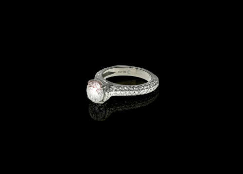 10.98 grams Platinum ORO Design Fancy Solitaire and Diamond Encrusted Ring