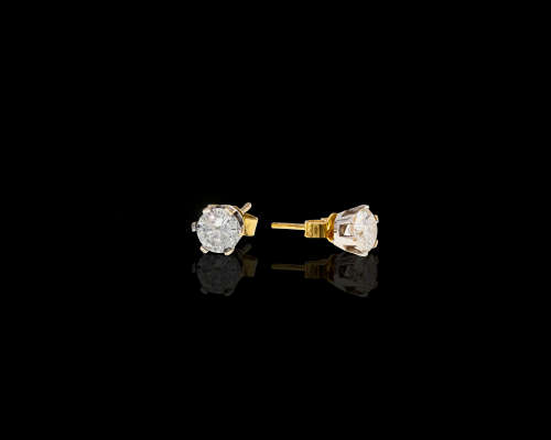 2.2 grams 18 carat Two Tone (Yellow And White Gold Diamond Stud Earrings