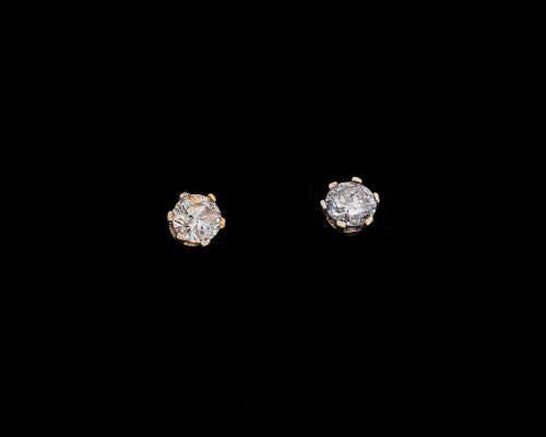 2.2 grams 18 carat Two Tone (Yellow And White Gold Diamond Stud Earrings
