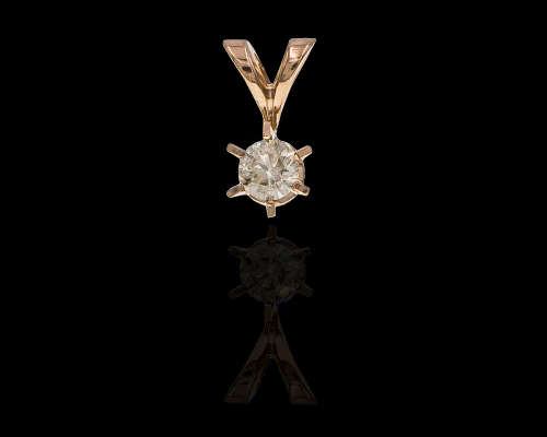2.3 grams 18 carat Rose Gold Diamond Pendant