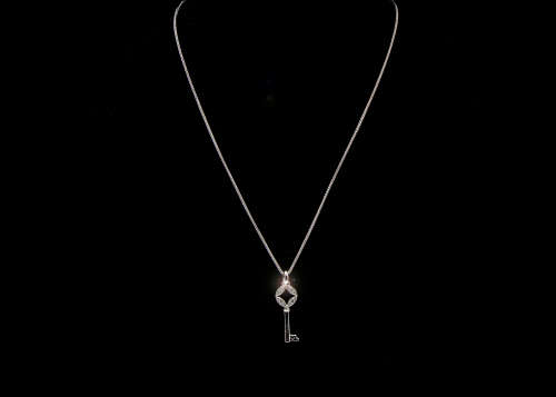 4.7 grams 14 carat White Gold Chain and Diamond Pendant