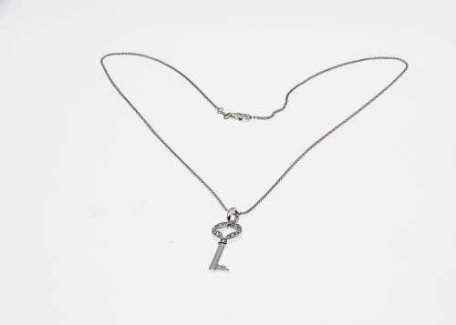 4.7 grams 14 carat White Gold Chain and Diamond Pendant