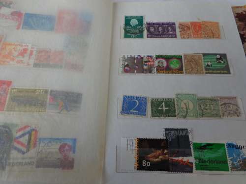 SMALL ALBUM FILLED WITH NETHL. AND HUNGARY STAMPS..(ESTATE)
