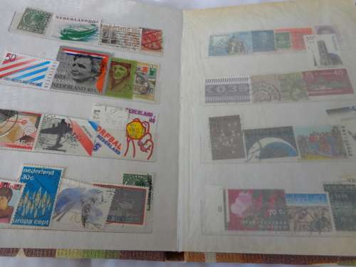 SMALL ALBUM FILLED WITH NETHL. AND HUNGARY STAMPS..(ESTATE)