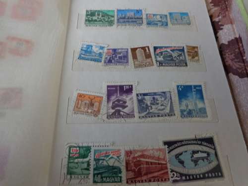 SMALL ALBUM FILLED WITH NETHL. AND HUNGARY STAMPS..(ESTATE)