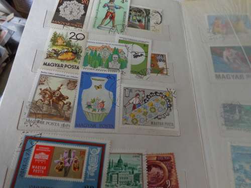 SMALL ALBUM FILLED WITH NETHL. AND HUNGARY STAMPS..(ESTATE)