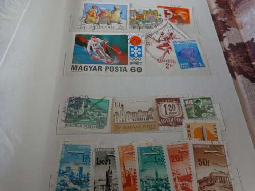 SMALL ALBUM FILLED WITH NETHL. AND HUNGARY STAMPS..(ESTATE)