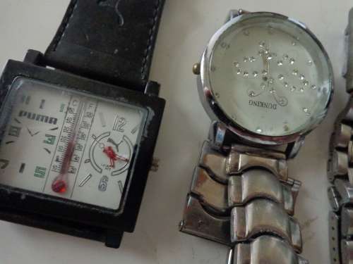 WATCHES FOUND IN ESTATE BAG (SELLING AS PARTS.).SEE SCANS READ ON