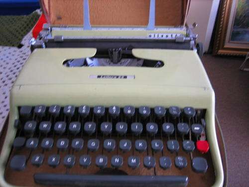 Old defence force,,ollevette,letterete 22 typewriter in zipcase.looksee...