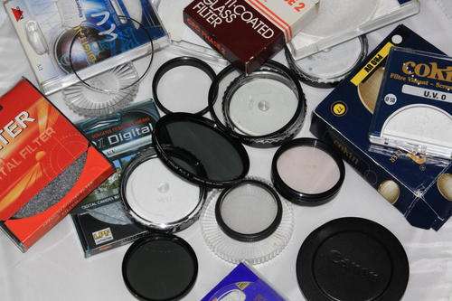 Lot of damaged filters and empty filter cases