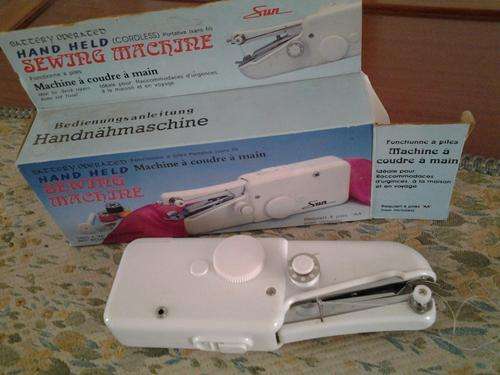 Vintage hand held sewing machine