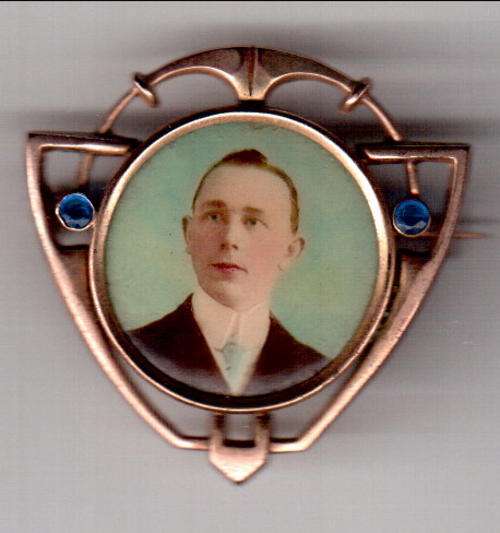 Very Old Gold Color brooch with picture - as per scan