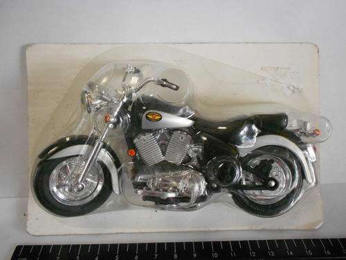Victory motorcycle, still sealed in packet - as per scan