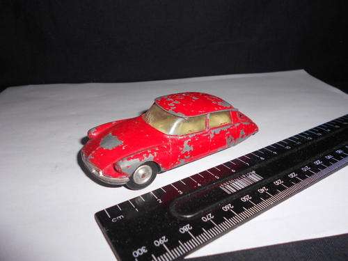 Red corgi Citroen DS 19, made in Great Britain, one tyre missing - as per scan
