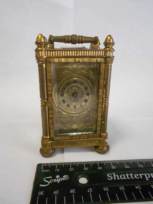 Small brass carriage clock, no key and needs new hands and a service as it is not working
