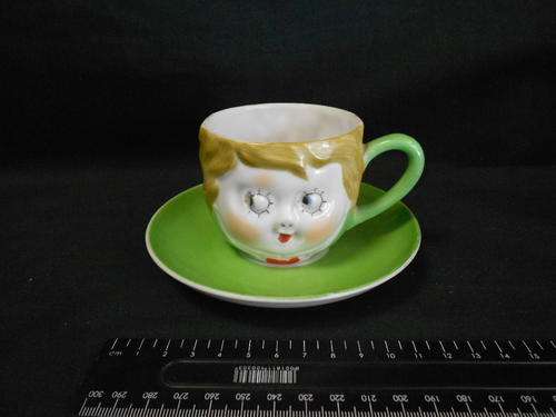 Noritake cup and saucer with funny face on it - CRAZY WEDNESDAY