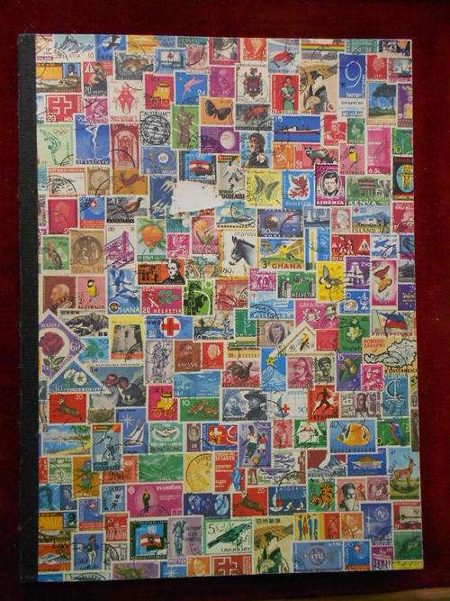Stamp Album with assorted stamps - as per scan