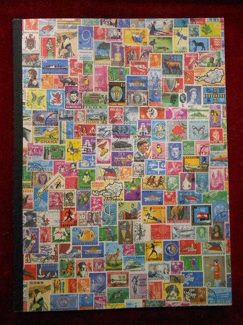 Stamp Album with assorted stamps - as per scan