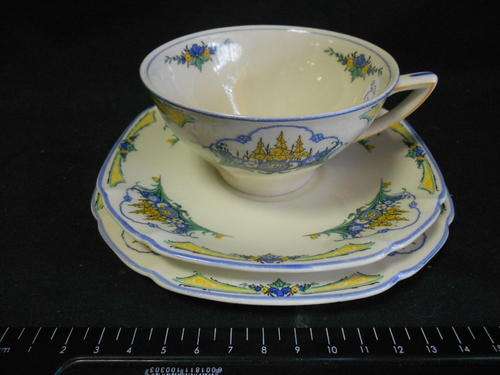 Royal Ivory, John Maddock and sons, tea set trio, small chip on bottom of sideplate