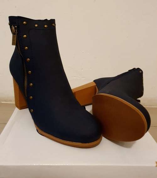## Trendy ## Size 5 / 7 **Navy Studded Ankle Boots **Sizes 5 / 7** Navy Only