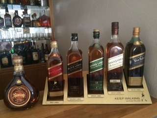 Entire Johnnie Walker range plus Gold display stand.